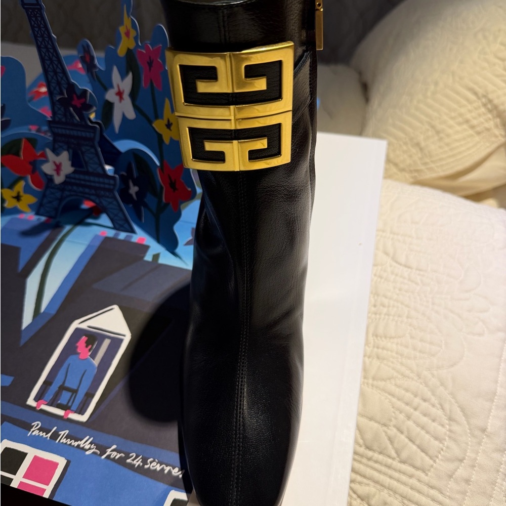 Givenchy Black Ankle Boots with Gold Accent. Certificate of authenticity
